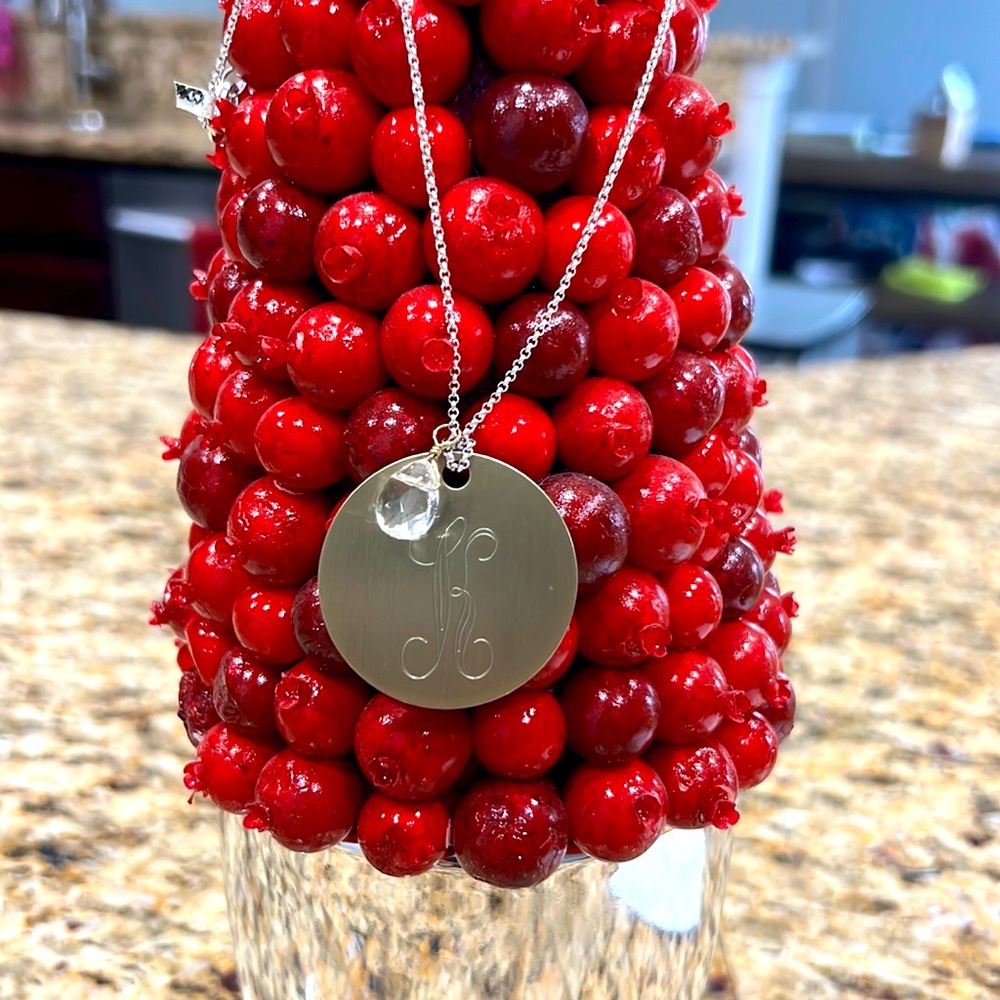 DANIELLE STEVENS LONG NECKLACE WITH A K LETTER PENDANT.